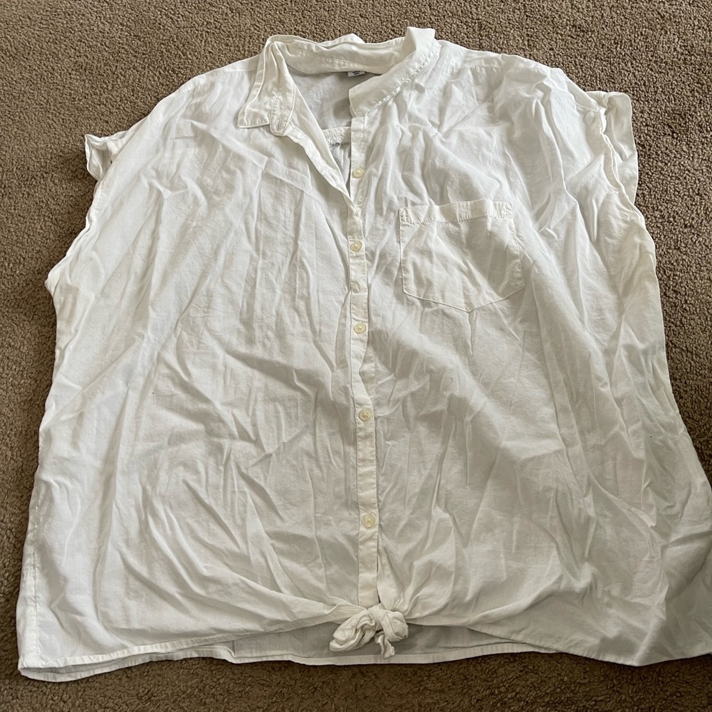 White sleeveless top